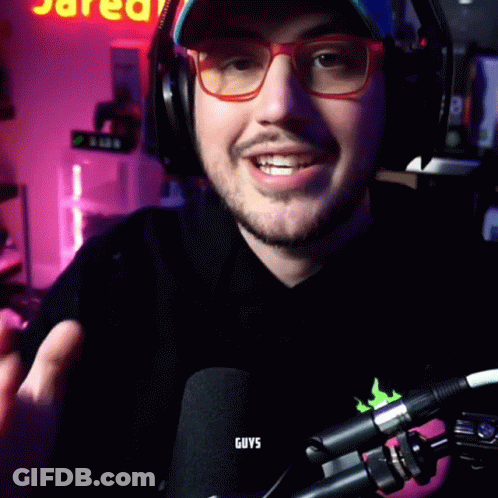 Man With Glasses And Headphones Smiling Saying Guys GIF