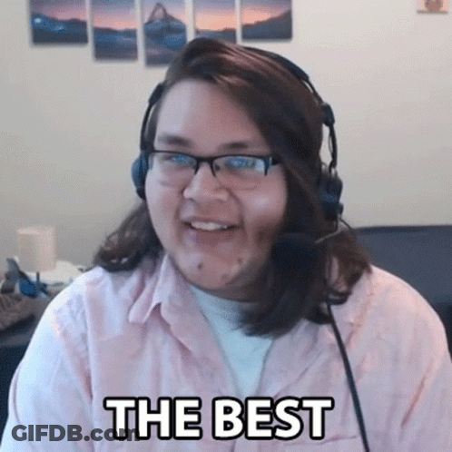 Man With Glasses And Headphones Smiling Saying The Best GIF