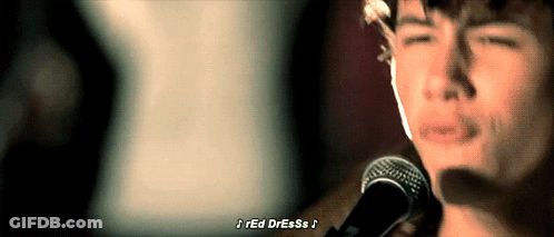 Man With Glasses And Headphones Talking Into Microphone GIF