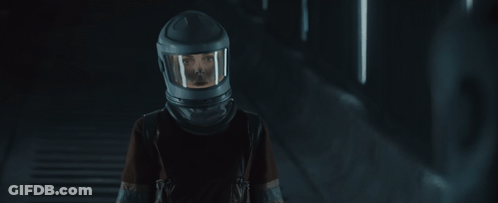 Man With Glasses And Helmet In Dark Room GIF
