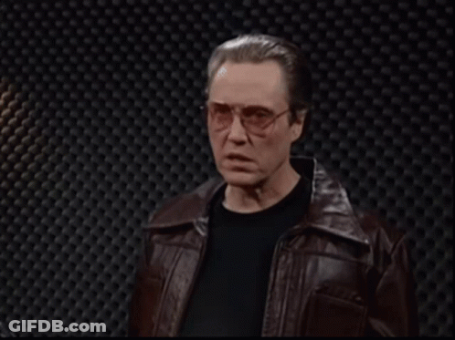 Man With Glasses And Leather Jacket Says Explore The Space GIF