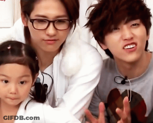 Man With Glasses And Little Girl Posing For Picture GIF