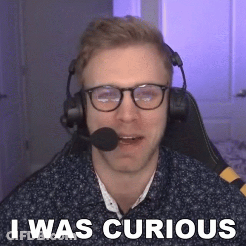Man With Glasses And Microphone Says I Was Curious GIF