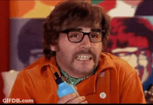 Man With Glasses And Mustache Holding Blue Bottle GIF