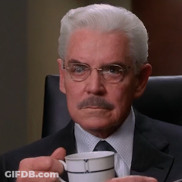 Man With Glasses And Mustache Holding Coffee GIF