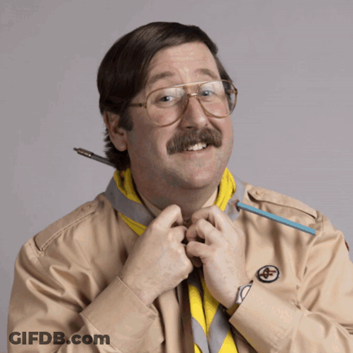 Man With Glasses And Mustache Holding Pen GIF