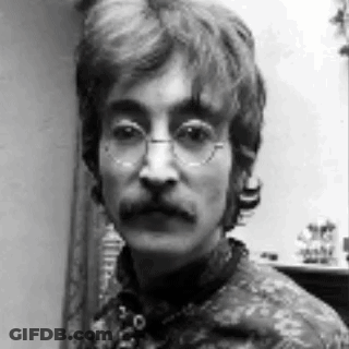 Man With Glasses And Mustache In Black And White Photo GIF