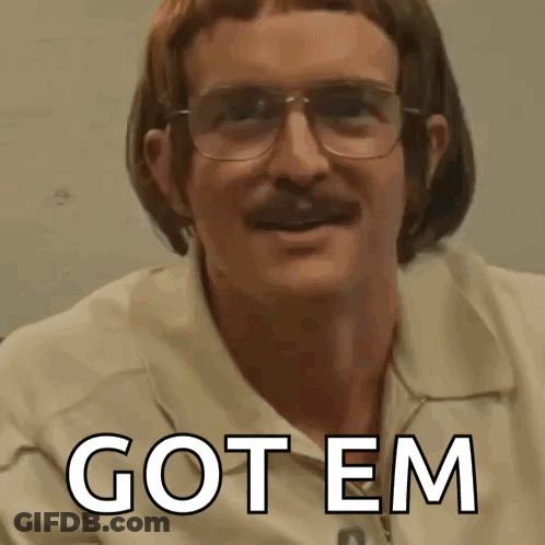 Man With Glasses And Mustache In Got Em Shirt GIF