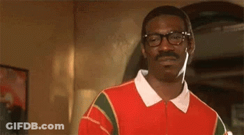 Man With Glasses And Mustache In Red And Green Sweater GIF