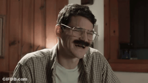 Man With Glasses And Mustache Laughing GIF