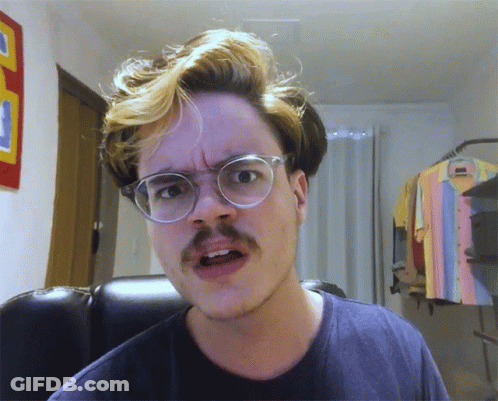 Man With Glasses And Mustache Making A Face GIF