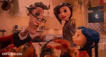 Man With Glasses And Mustache Next To Two Dolls GIF
