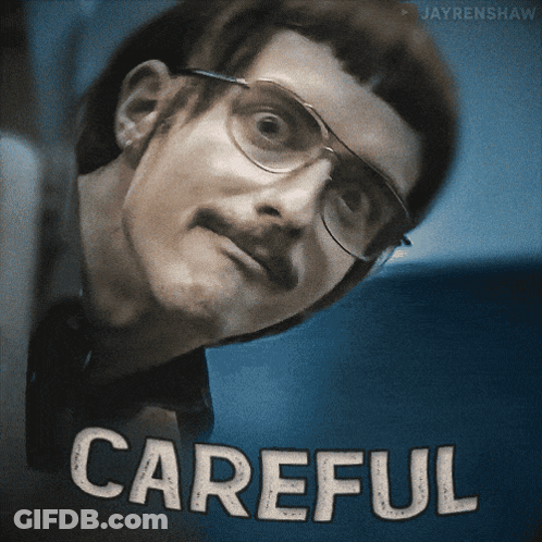 Man With Glasses And Mustache Saying Careful GIF