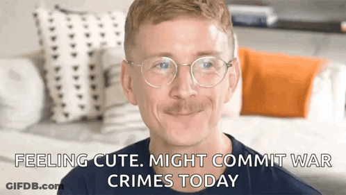 Man With Glasses And Mustache Smiling Feeling Cute Might Commit War Crimes GIF