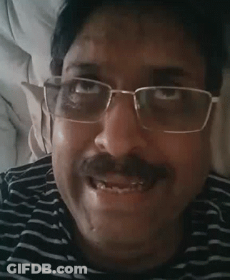 Man With Glasses And Mustache Smiling GIF