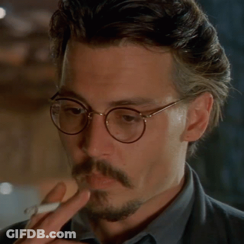 Man With Glasses And Mustache Smoking GIF
