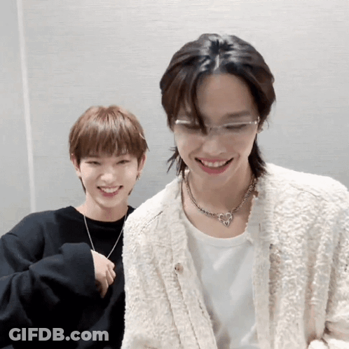 Man With Glasses And Necklace Smiling GIF