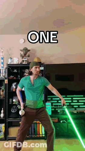 Man With Glasses And Number 20 On Green GIF