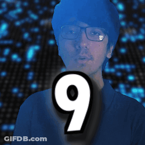Man With Glasses And Number 9 GIF