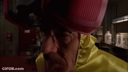Man With Glasses And Pink Helmet Looking GIF