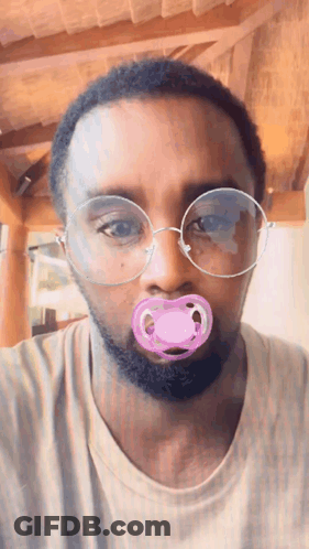 Man With Glasses And Pink Pacifier GIF