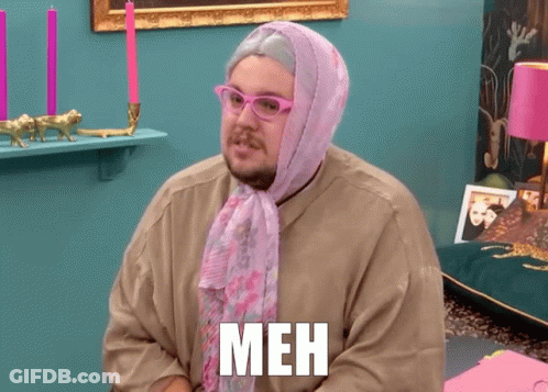 Man With Glasses And Pink Scarf Saying Meh On Shirt GIF