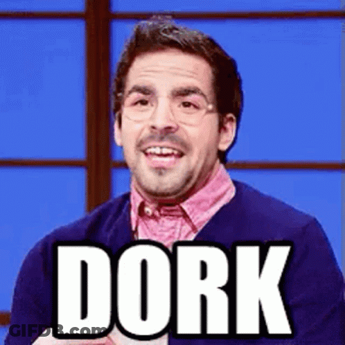 Man With Glasses And Pink Shirt Smiling Says Dork GIF