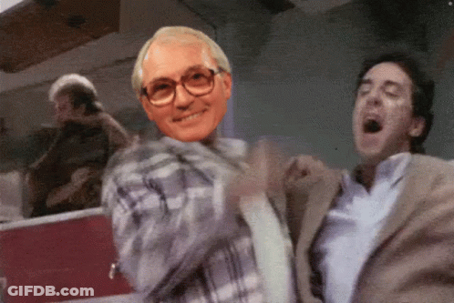 Man With Glasses And Plaid Shirt Dancing With Another Man GIF
