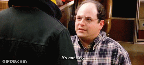 Man With Glasses And Plaid Shirt Says It's Not Easy GIF
