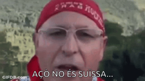 Man With Glasses And Red Headband Says Aço No Es Suissa GIF