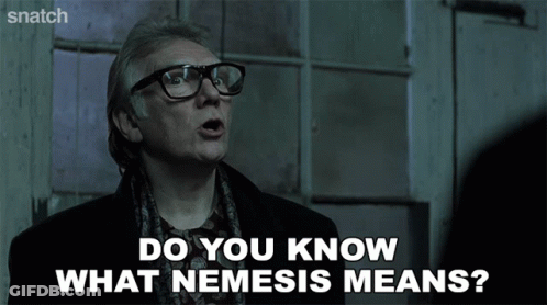 Man With Glasses And Scarf Saying Do You Know What Nemesis Means GIF