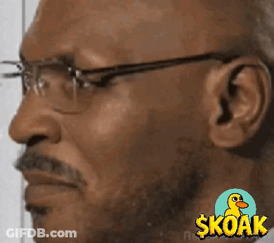 Man With Glasses And Skoak Logo GIF