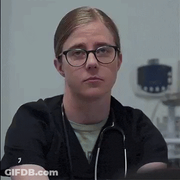Man With Glasses And Stethoscope Looking At Camera GIF