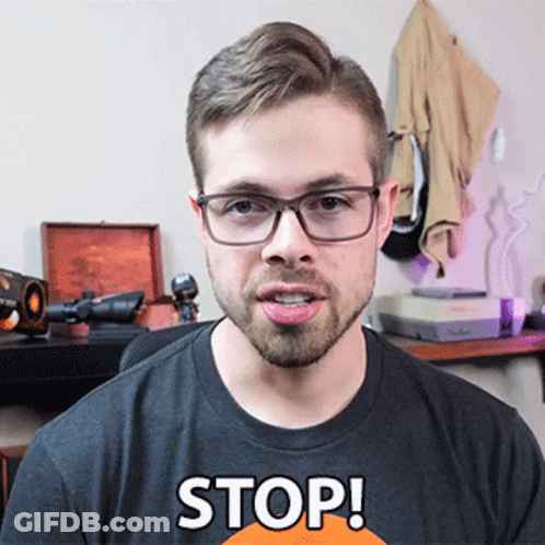 Man With Glasses And Stop Shirt GIF