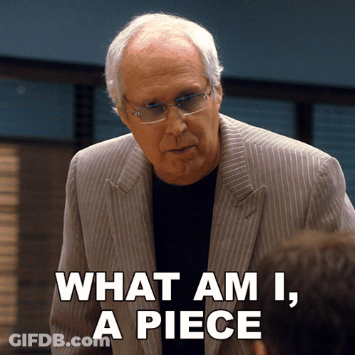 Man With Glasses And Suit Says What Am I A Piece GIF