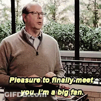 Man With Glasses And Sweater Saying Pleasure To Meet You GIF