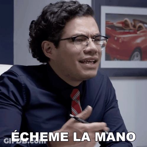 Man With Glasses And Tie Saying Echeme La Mano Holding Pen GIF