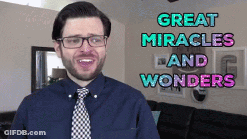 Man With Glasses And Tie Saying Great Miracles And Wonders GIF