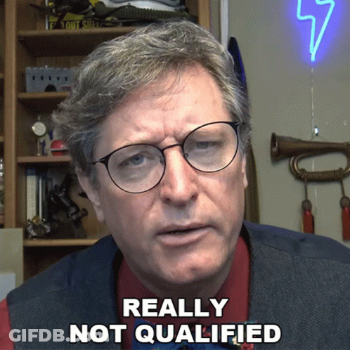 Man With Glasses And Vest Saying Really Not Qualified GIF