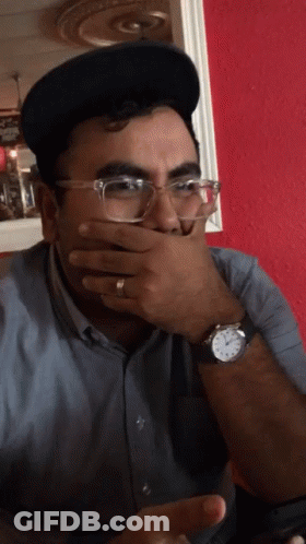 Man With Glasses And Watch Covering Mouth GIF