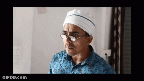 Man With Glasses And White Hat Looking Left GIF