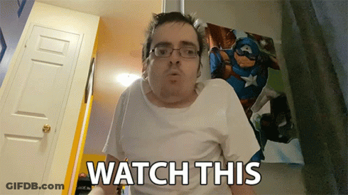 Man With Glasses And White Shirt Saying Watch This GIF