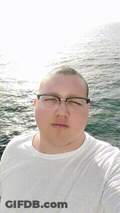 Man With Glasses And White Shirt Taking Selfie GIF