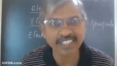 Man With Glasses At Blackboard Saying Electro GIF