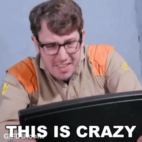 Man With Glasses At Laptop Says This Is Crazy GIF