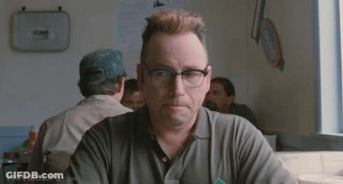Man With Glasses At Table GIF