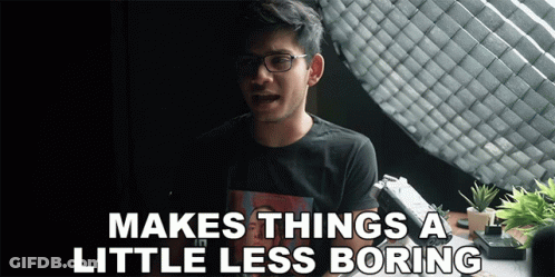 Man With Glasses Black Shirt Makes Things Less Boring GIF