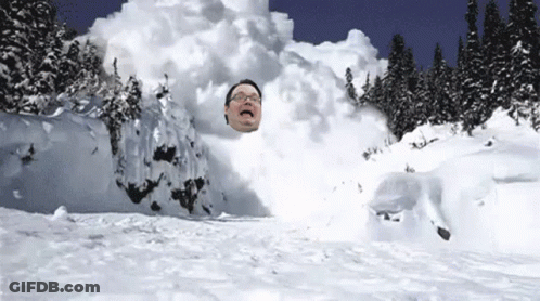 Man With Glasses Covered In Snow GIF