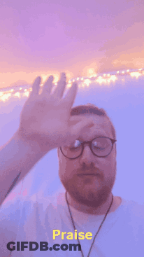 Man With Glasses Covering Face Saying Praise GIF