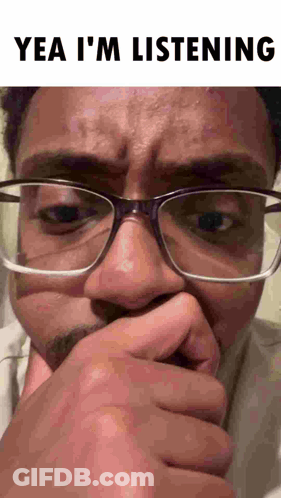 Man With Glasses Covering Mouth Making Funny Face GIF